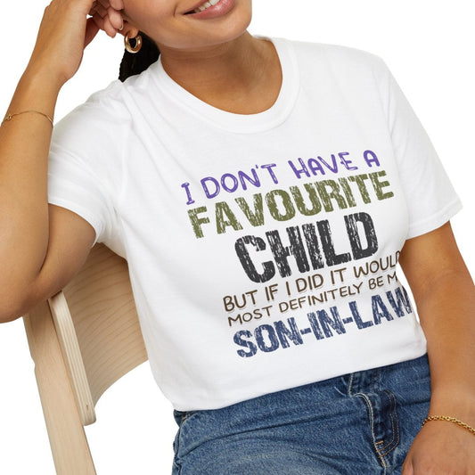 Person wearing a white t-shirt with humorous text, sitting on a chair.