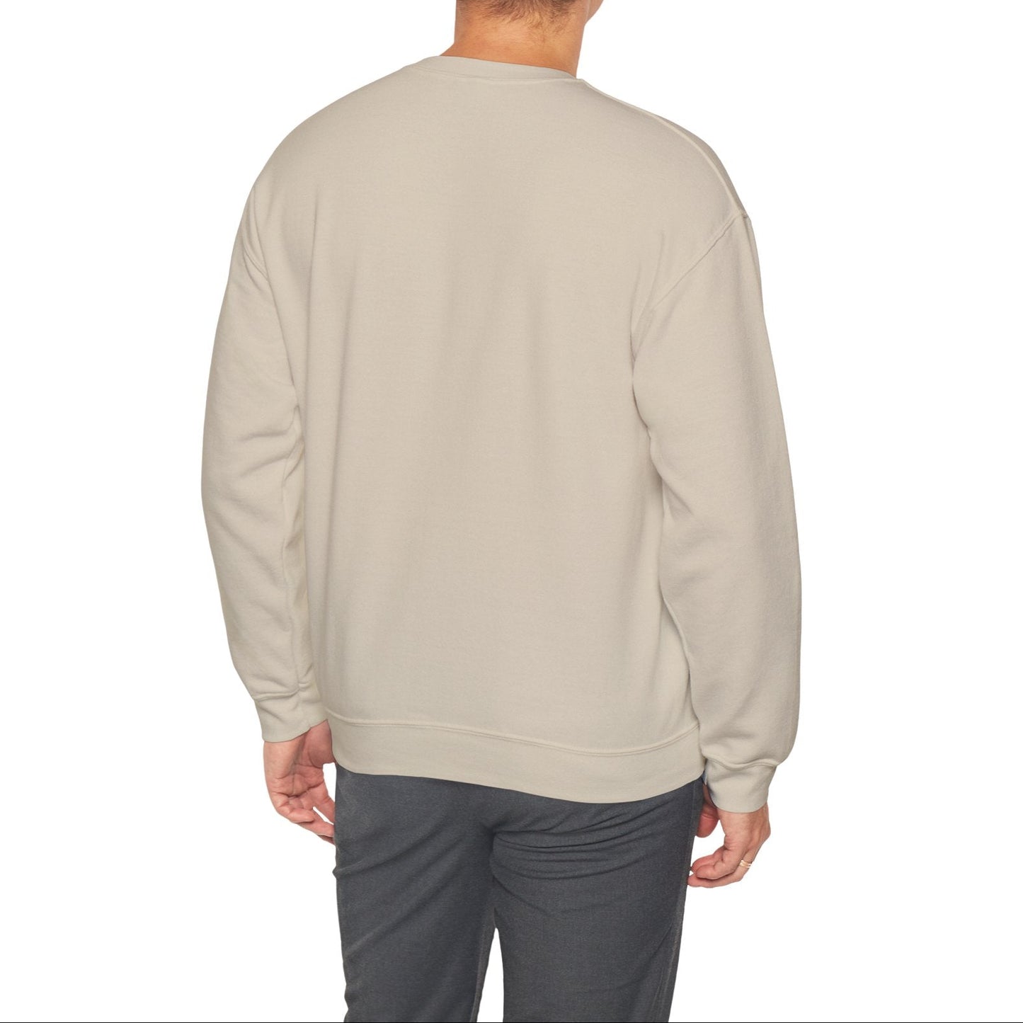 Man wearing a beige sweatshirt on a white background