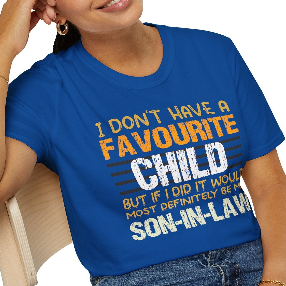 Person wearing a royal blue t-shirt with humorous text design.