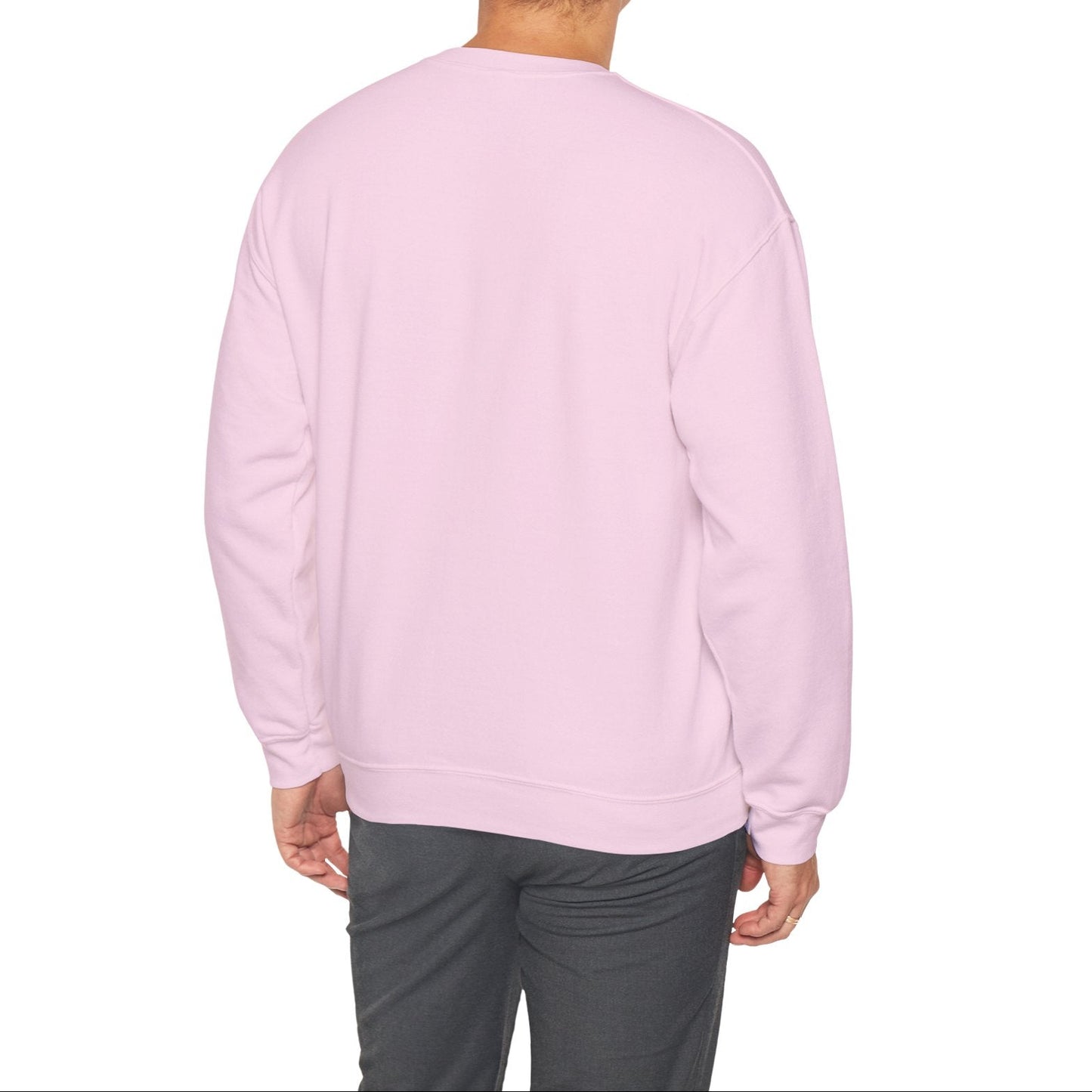 Person wearing a light pink sweatshirt on a white background