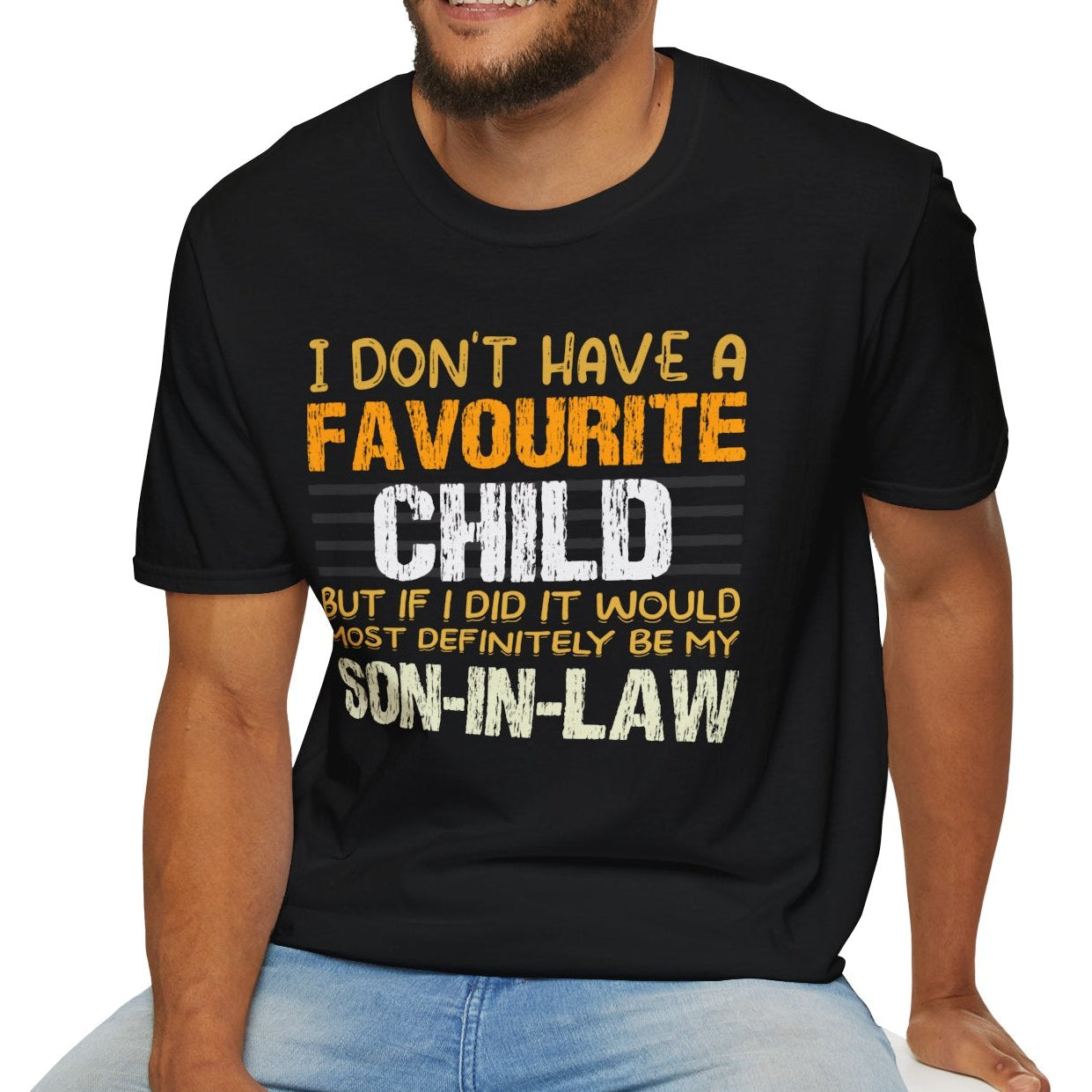Man wearing a black t-shirt with humorous text design on a white background