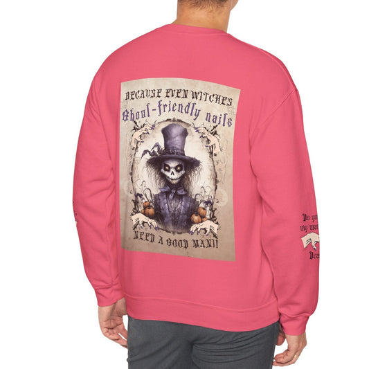 Person wearing a pink sweatshirt with a graphic design on the back, standing against a white background.