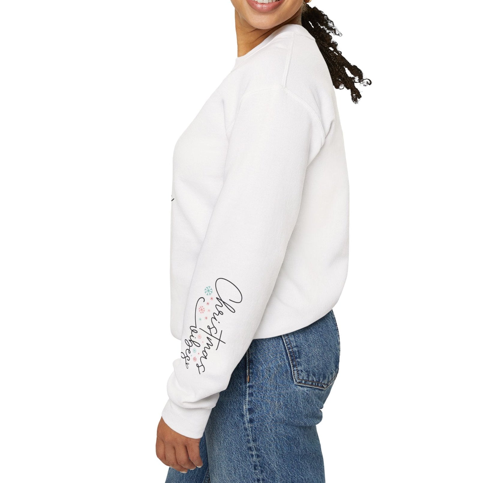 Woman wearing a white sweatshirt with text on the sleeve against a white background