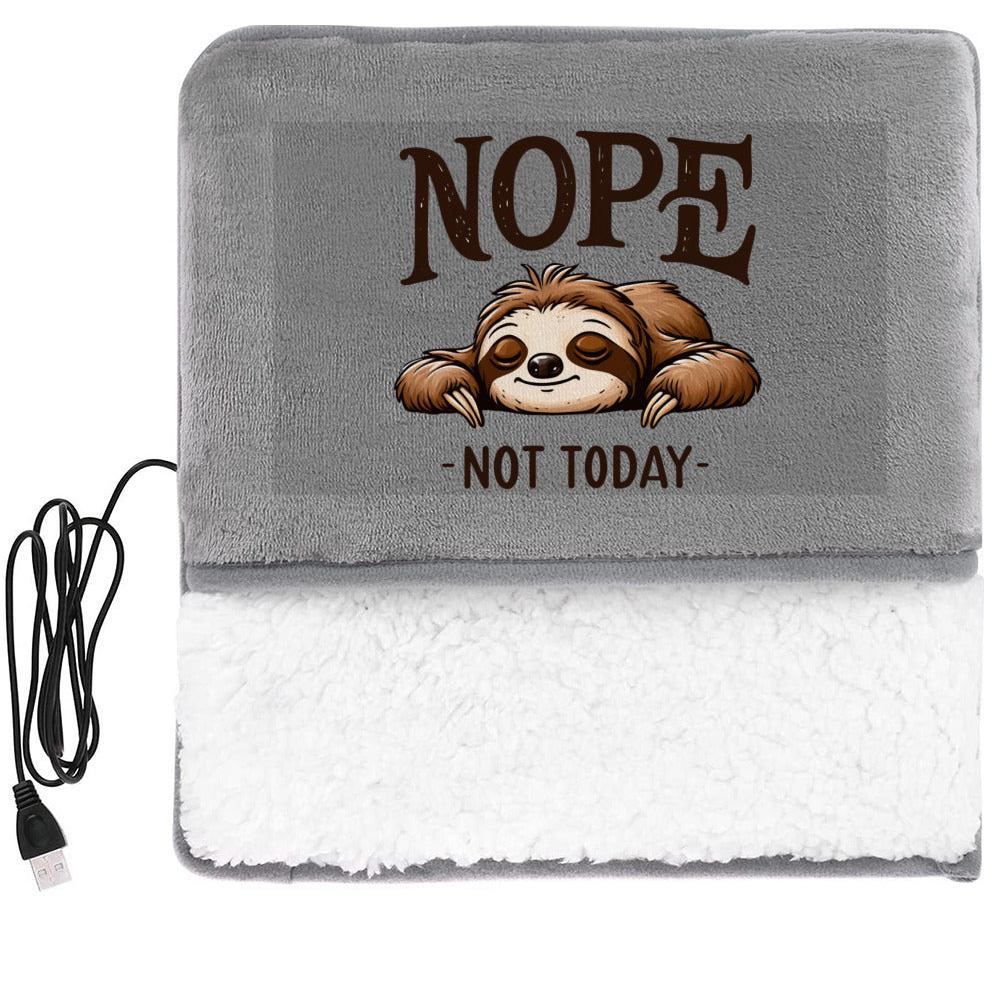 Gray heating pad with USB cable and 'Not Today, Nope' text and sloth design.