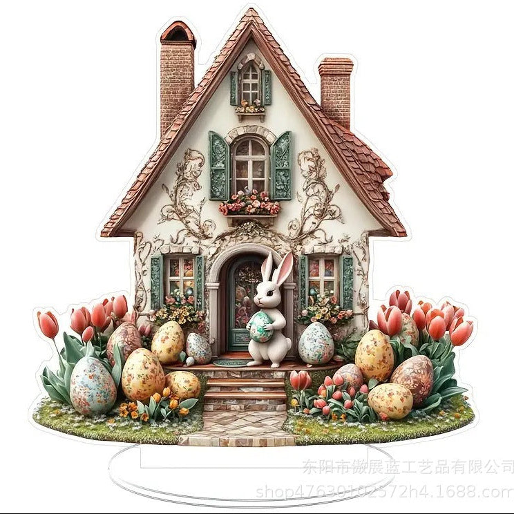 Decorative house with rabbit and Easter eggs on a white background