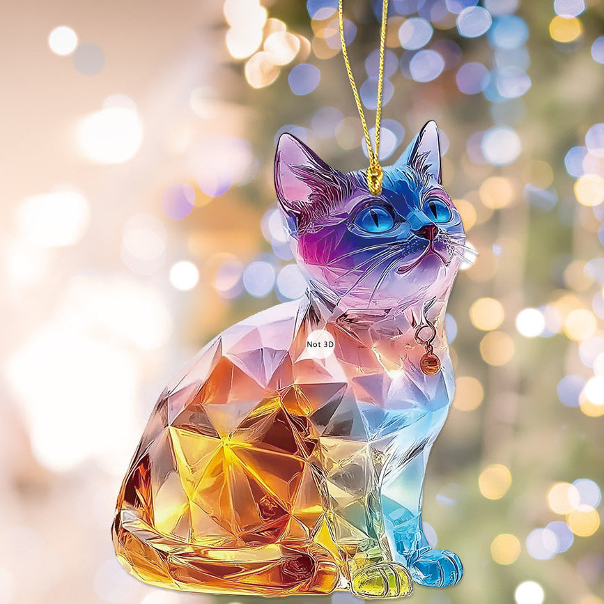 Colorful glass cat ornament with a blurred festive background