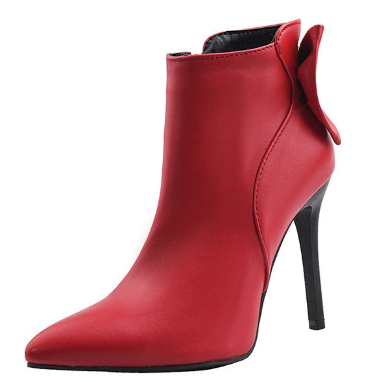 Red high-heeled ankle boot on a white background