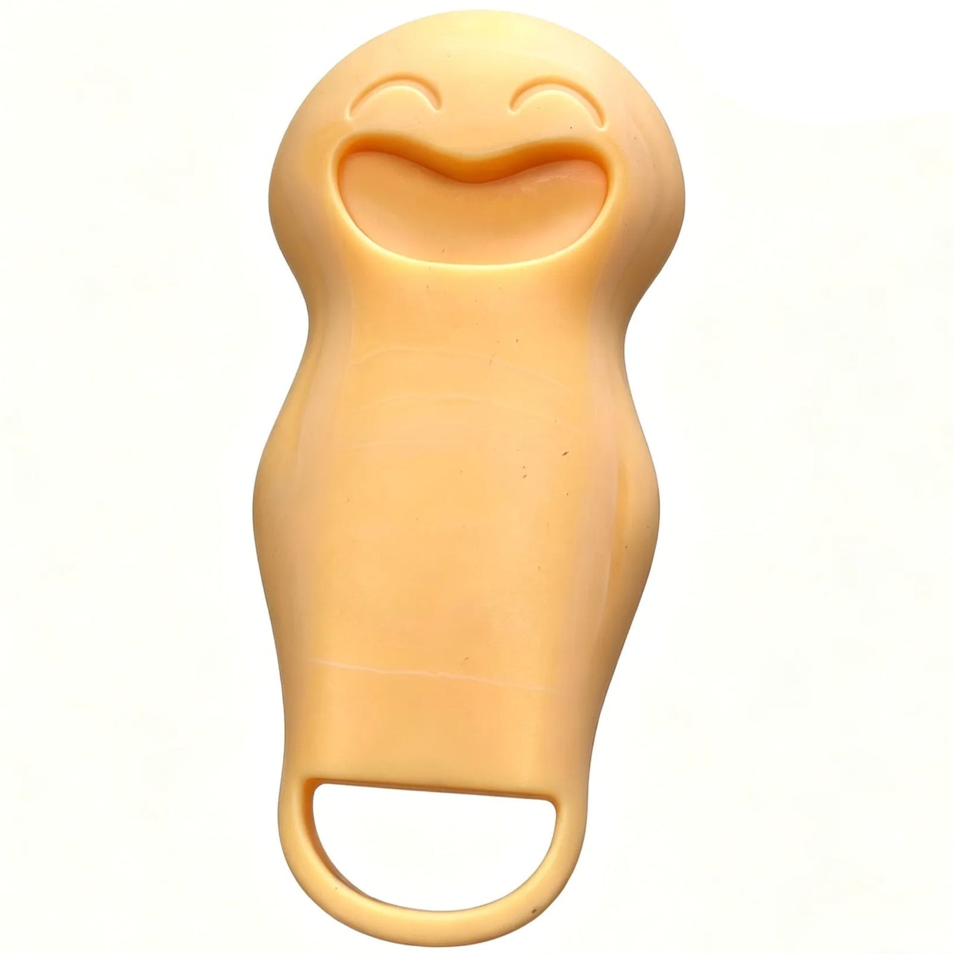 Gold coloured silicone scrubber with textured surface on a white background