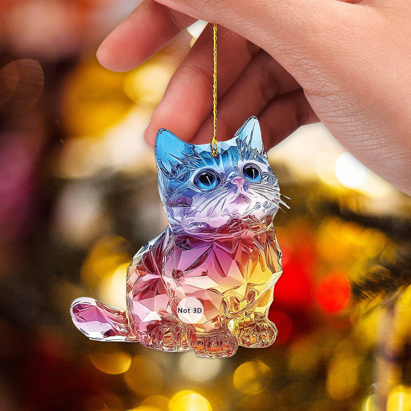 Colorful cat-shaped ornament held by a hand against a blurred festive background.