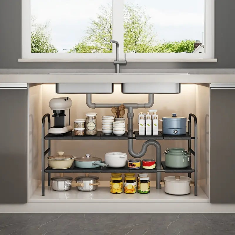Under-cabinet shelving unit with kitchenware in a modern kitchen.