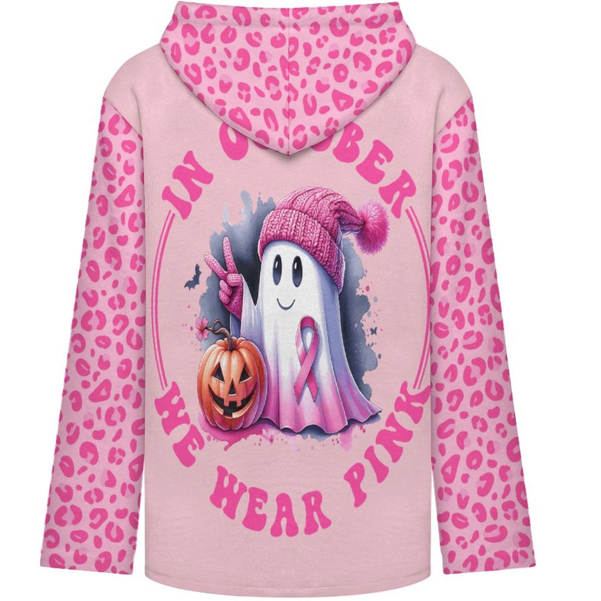 A pink hoodie shown from the back, featuring a pink leopard print pattern on the hood and sleeves, and a large graphic in the center of a ghost wearing a pink knit toque, a pink breast cancer ribbon, and a jack-o'-lantern with the text 'IN OCTOBER WE WEAR PINK'.
