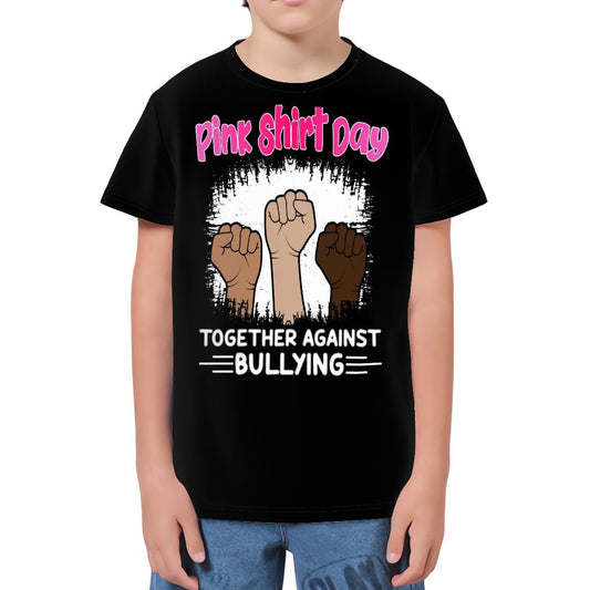 Youth wearing a black t-shirt with 'Pink Shirt Day' text and multicolored fists design.