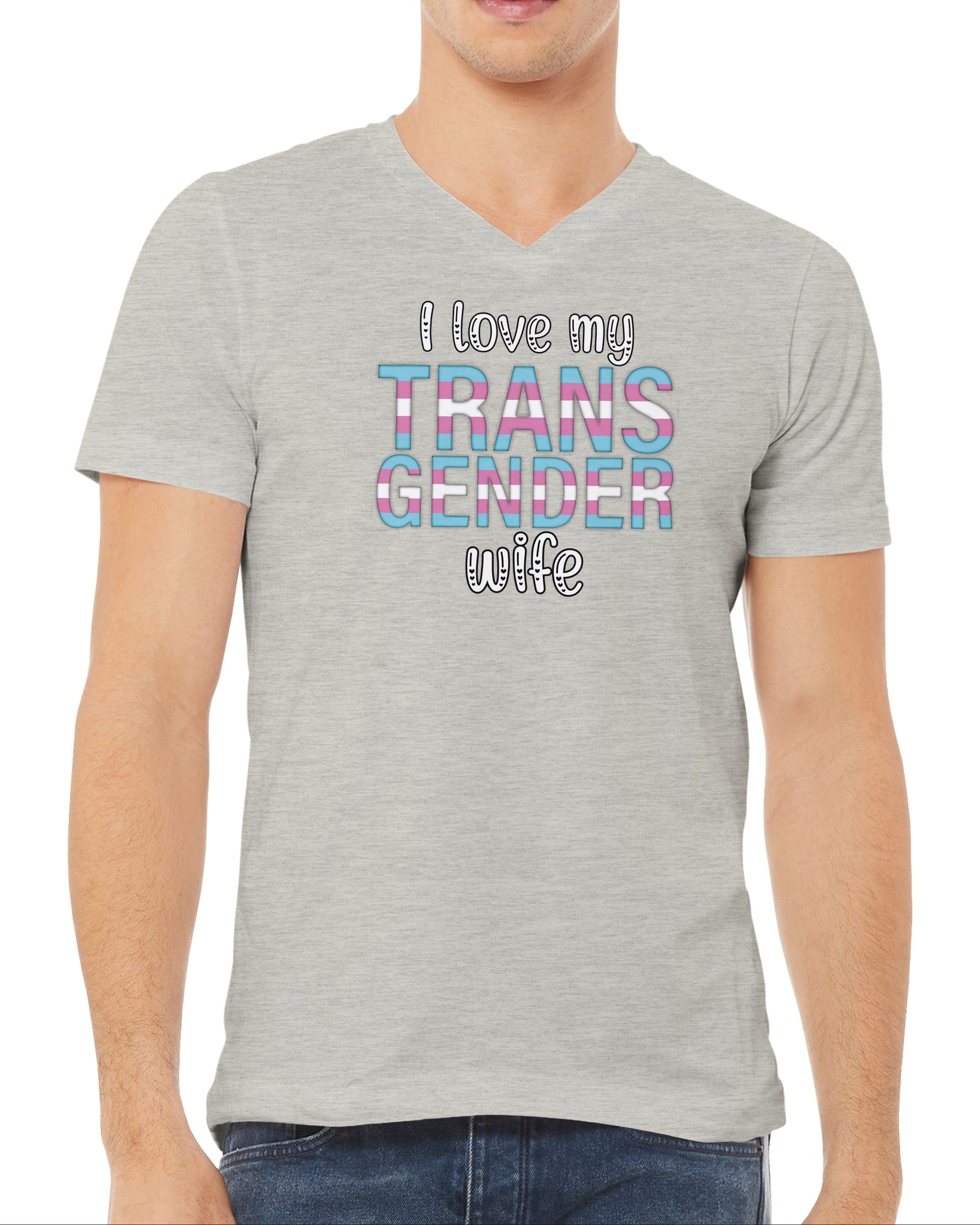Person wearing a gray t-shirt with 'I love my TRANS GENDER wife' text.